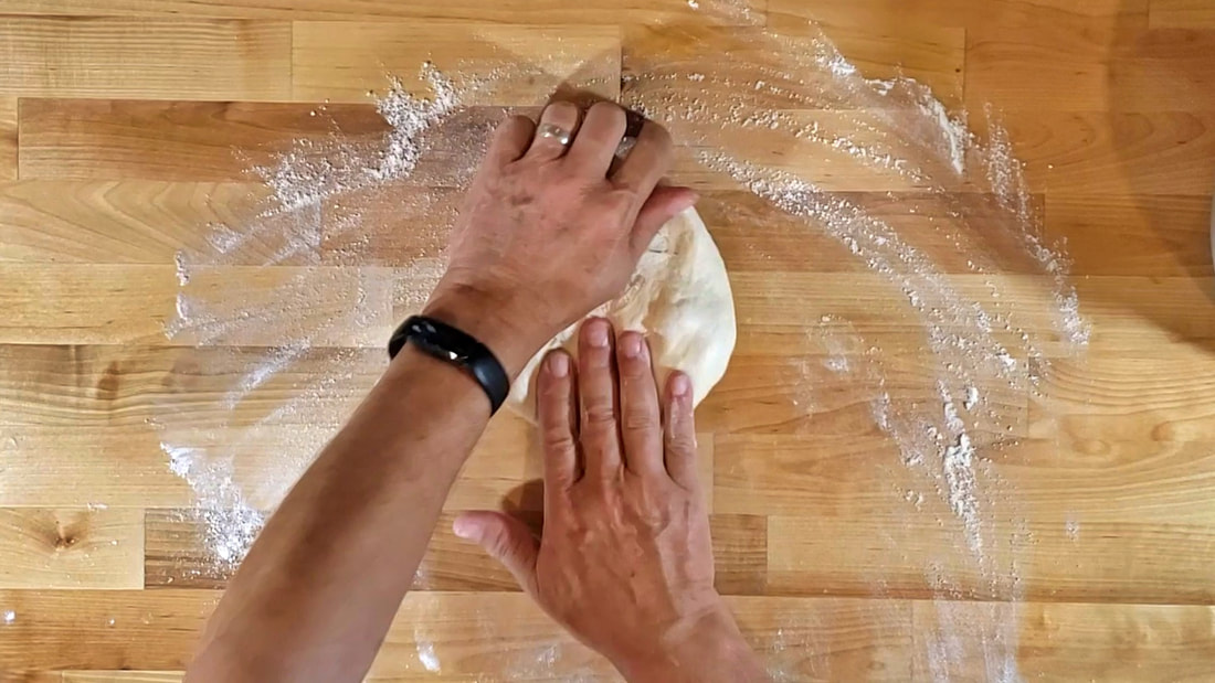 Flatten the piece of dough