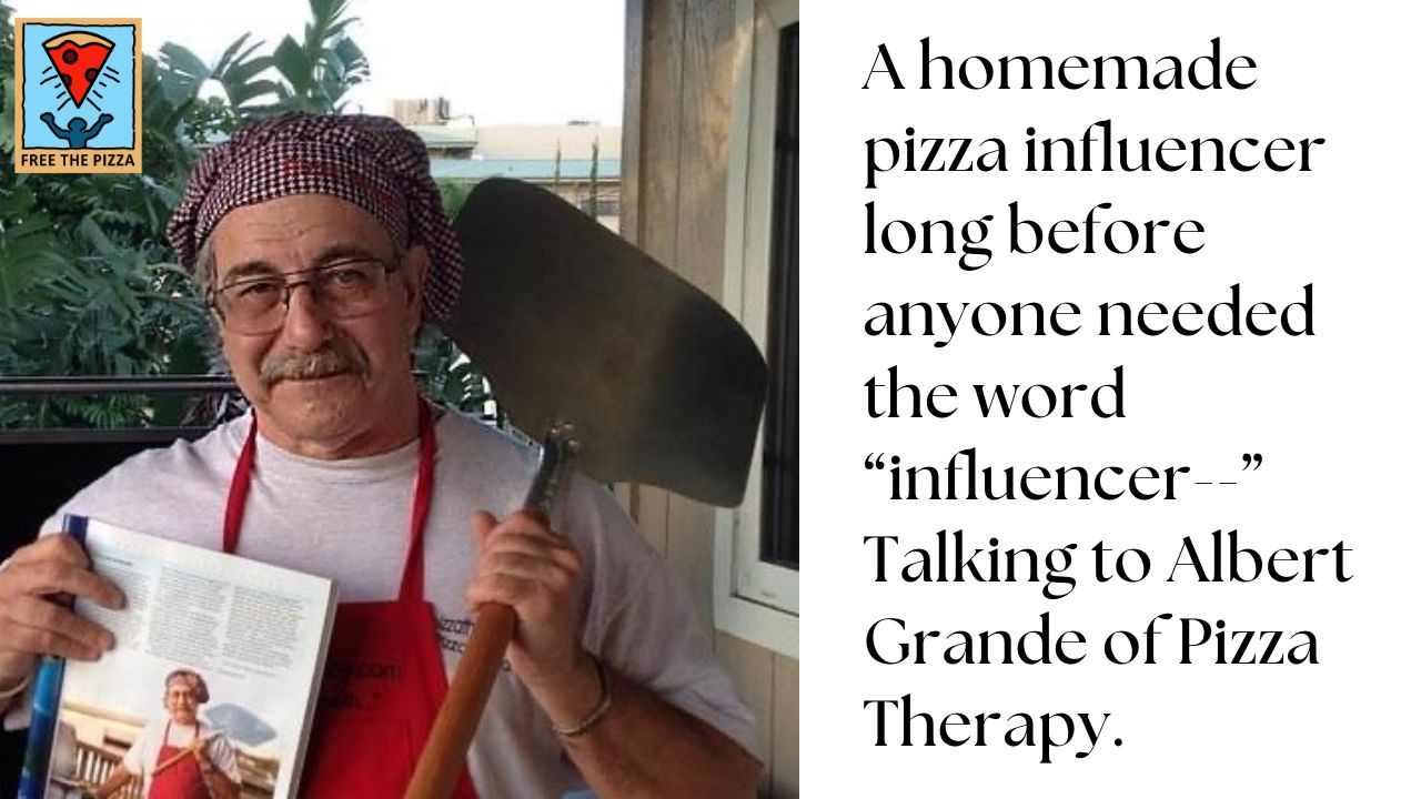 Albert Grande with pizza peel and magazine