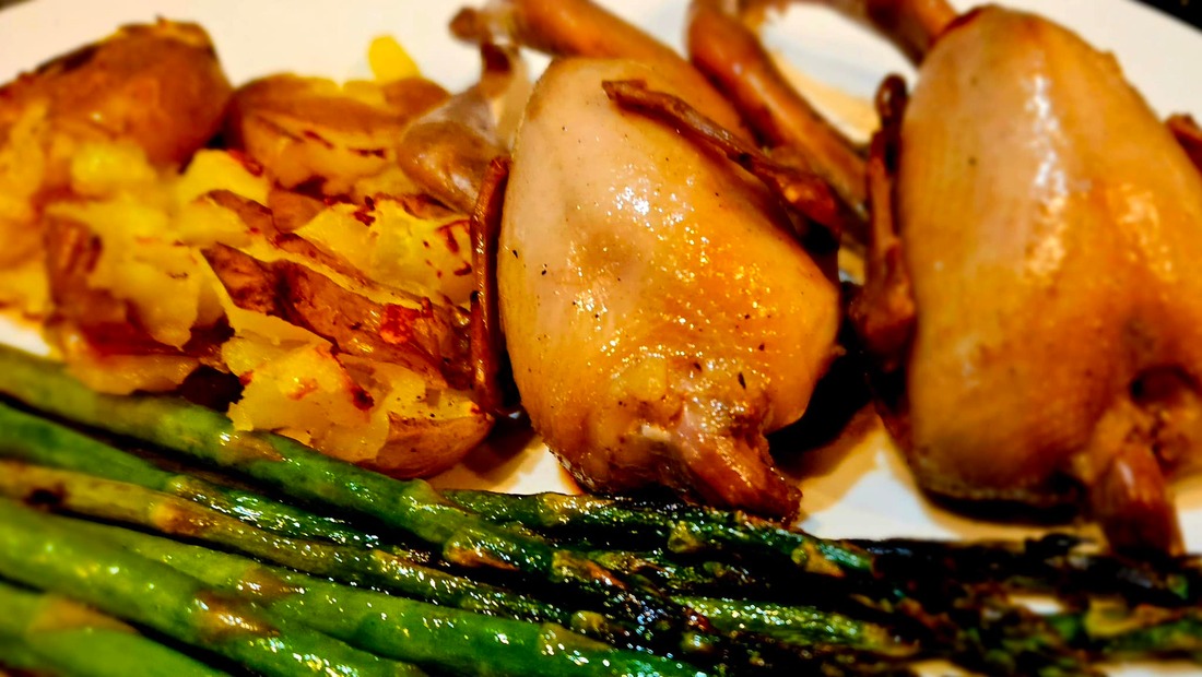 roasted quail with asparagus and smashed new potatoes