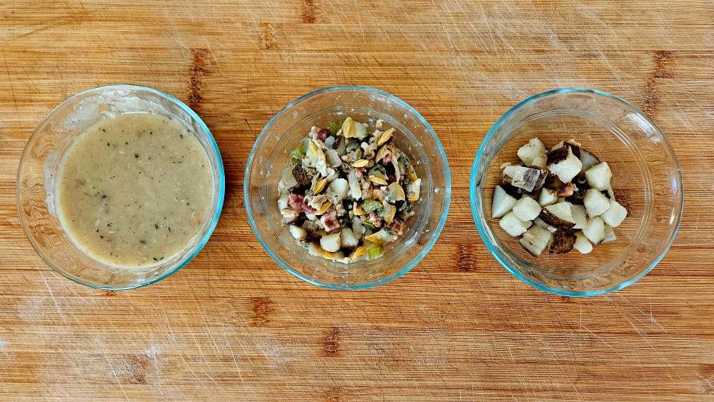 Clam chowder components separated into bowls